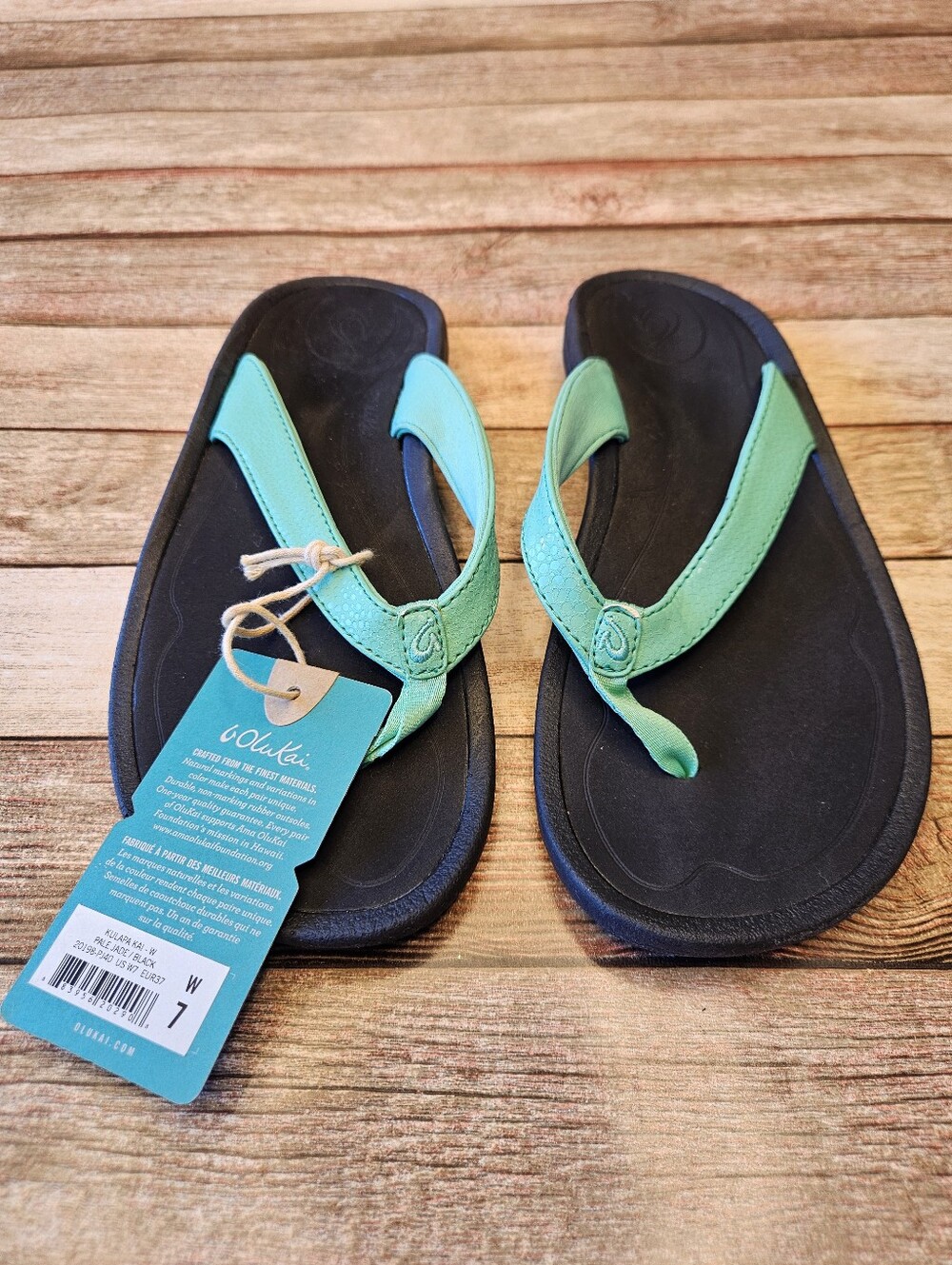 OluKai Kulapa Kai Women's Beach Sandals in the Pale Jade / Black colorway